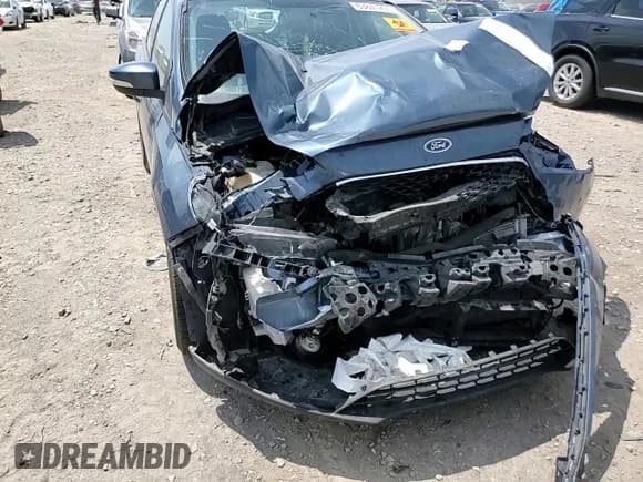 ✅ 2018 Ford Focus SEL • VIN: 1FADP3M29JL303097 • Лот: 63841205. Опубликован ранее на Copart с пробегом Не указан. Бесплатный доступ к архиву аукционных продаж из США и подробный отчёт об истории автомобиля на DreamBid. Изображение 13.