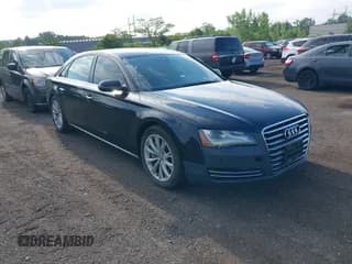 ✅ 2011 Audi A8 • VIN: WAURVAFD4BN018884 • Lot: 42693000. Listed on IAAI with 116,952 mi. Free auction sales archive from the USA and detailed vehicle history report at DreamBid. Image 1.