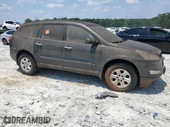 ✅ 2009 Chevrolet Traverse LS • VIN: 1GNEV13D69S162574 • Lot: 62052225. Wystawiony na Copart z przebiegiem 175 811 mil. Bezpłatny archiwum sprzedaży aukcyjnych z USA i szczegółowy raport historii pojazdu na DreamBid. Zdjęcie 4.