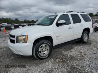 2011 Chevrolet Tahoe LS with VIN 1GNSCAE07BR263350, listed as a Copart auction lot 85188265 with 210,283 mi miles and Salvage title. Bid and sale history available at DreamBid. Image 1.