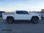 ✅ 2023 Toyota Tacoma TRD Off Road • VIN: 3TMCZ5AN7PM596113 • Lot: 43905623. Listed on IAAI with 56,739 mi. Free auction sales archive from the USA and detailed vehicle history report at DreamBid. Image 14.