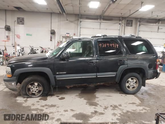 ✅ 2002 Chevrolet Tahoe LT • VIN: 1GNEK13Z72J242434 • Lot: 43894914. Listed on IAAI with 307,748 mi. Free auction sales archive from the USA and detailed vehicle history report at DreamBid. Image 12.