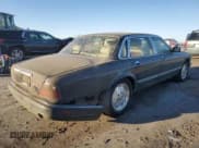 ✅ 1995 Jaguar XJ • VIN: SAJKX1747SC722815 • Лот: 83743934. Опубликован ранее на Copart с пробегом Не указан. Бесплатный доступ к архиву аукционных продаж из США и подробный отчёт об истории автомобиля на DreamBid. Изображение 3.