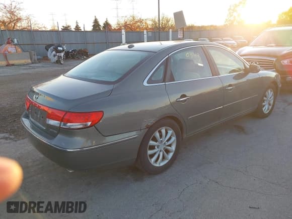 ✅ 2007 Hyundai Azera SE • VIN: KMHFC46F77A194403 • Lot: 43650343. Listed on IAAI with 148,624 mi. Free auction sales archive from the USA and detailed vehicle history report at DreamBid. Image 4.