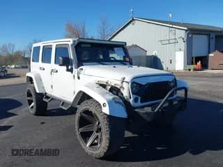 ✅ 2013 Jeep Wrangler Unlimited Sahara • VIN: 1C4BJWEG5DL554444 • Lot: 43561456. Listed on IAAI with 157,026 mi. Free auction sales archive from the USA and detailed vehicle history report at DreamBid. Image 1.