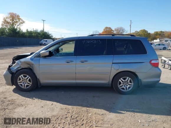 ✅ 2007 Honda Odyssey EX-L • VIN: 5FNRL38657B123023 • Lot: 43620613. Wystawiony na IAAI z przebiegiem 307 648 mil. Bezpłatny archiwum sprzedaży aukcyjnych z USA i szczegółowy raport historii pojazdu na DreamBid. Zdjęcie 14.