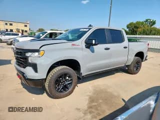 ✅ 2024 Chevrolet Silverado 1500 LT Trail Boss • VIN: 3GCUDFE88RG284025 • Lot: 67587795. Wystawiony na Copart z przebiegiem 23 887 mil. Bezpłatny archiwum sprzedaży aukcyjnych z USA i szczegółowy raport historii pojazdu na DreamBid. Zdjęcie 1.