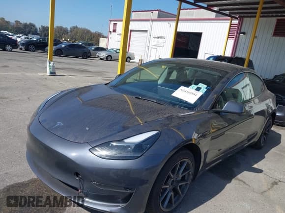 ✅ 2023 Tesla Model 3 • VIN: 5YJ3E1EA2PF668853 • Lot: 42316581. Listed on IAAI with 16,859 mi. Free auction sales archive from the USA and detailed vehicle history report at DreamBid. Image 2.
