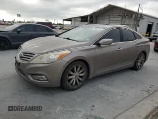 ✅ 2013 Hyundai Azera • VIN: KMHFH4JG6DA231521 • Лот: 50327805. Опубликован ранее на Copart с пробегом 176 041 миль. Бесплатный доступ к архиву аукционных продаж из США и подробный отчёт об истории автомобиля на DreamBid. Изображение 1.
