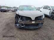 ✅ 2015 Lincoln MKS EcoBoost • VIN: 1LNHL9FT5FG601058 • Lot: 42075917. Listed on IAAI with 141,937 mi. Free auction sales archive from the USA and detailed vehicle history report at DreamBid. Image 6.