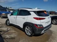 ✅ 2022 Hyundai Kona SEL • VIN: KM8K3CAB4NU858293 • Лот: 56048064. Опубликован ранее на Copart с пробегом 62 060 миль. Бесплатный доступ к архиву аукционных продаж из США и подробный отчёт об истории автомобиля на DreamBid. Изображение 2.