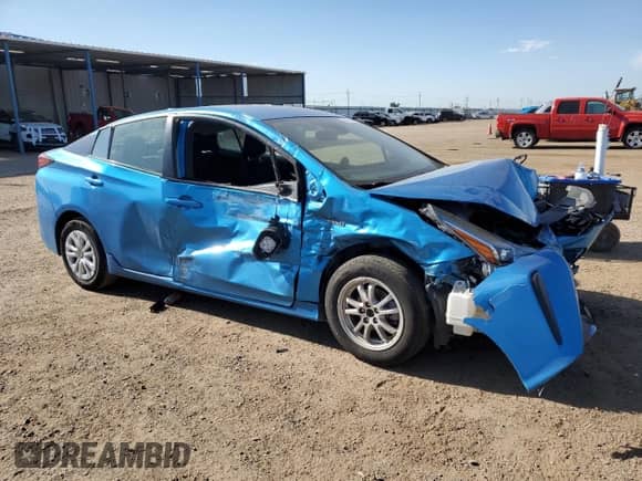 2021 Toyota Prius L Eco с VIN JTDKAMFU1M3143809, выставлен на аукционе Copart как лот 64057345 с пробегом 130 260 миль миль и Списание • Salvage title. История ставок и продаж доступна на DreamBid. Изображение 4.