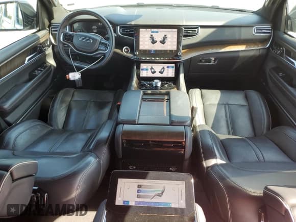 ✅ 2023 Jeep Grand Wagoneer Series II • VIN: 1C4SJSFP1PS529767 • Лот: 57416505. Опубликован ранее на Copart с пробегом 62 927 миль. Бесплатный доступ к архиву аукционных продаж из США и подробный отчёт об истории автомобиля на DreamBid. Изображение 8.