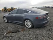 ✅ 2015 Tesla Model S 85D • VIN: 5YJSA1E20FF117416 • Lot: 90315585. Wystawiony na Copart z przebiegiem 119 245 mil. Bezpłatny archiwum sprzedaży aukcyjnych z USA i szczegółowy raport historii pojazdu na DreamBid. Zdjęcie 2.
