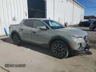 2022 Hyundai Santa Cruz SEL z VIN 5NTJBDAE6NH020359, wystawiony jako Copart lot #75840064 z przebiegiem 14 544 mil mil oraz Szkoda całkowita • Salvage title. Historia ofert i sprzedaży dostępna na DreamBid. Obrazek 4.