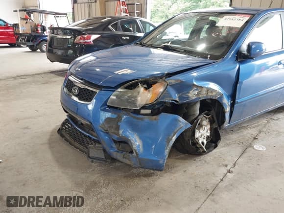 ✅ 2010 Kia Rio LX • VIN: KNADH4A37A6652068 • Lot: 42985384. Listed on IAAI with 72,837 mi. Free auction sales archive from the USA and detailed vehicle history report at DreamBid. Image 6.