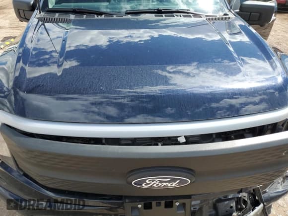 ✅ 2024 Ford F-150 Lightning XLT • VIN: 1FTVW3LK2RWG09622 • Lot: 70783605. Listed on Copart with 7,861 mi. Free auction sales archive from the USA and detailed vehicle history report at DreamBid. Image 11.