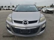 ✅ 2012 Mazda CX-7 i Touring • VIN: JM3ER2CM8C0420493 • Lot: 70712625. Wystawiony na Copart z przebiegiem 126 307 mil. Bezpłatny archiwum sprzedaży aukcyjnych z USA i szczegółowy raport historii pojazdu na DreamBid. Zdjęcie 5.