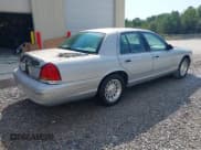 ✅ 1999 Ford Crown Victoria LX • VIN: 2FAFP74WXXX221345 • Lot: 43232145. Listed on IAAI with 225,067 mi. Free auction sales archive from the USA and detailed vehicle history report at DreamBid. Image 4.