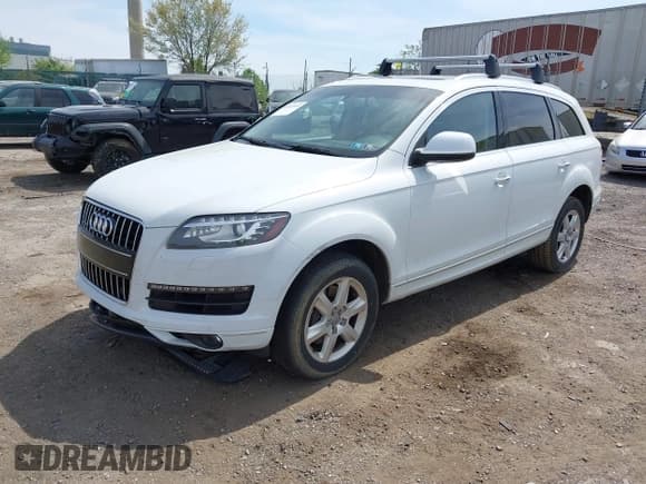 ✅ 2015 Audi Q7 Premium Plus • VIN: WA1LGAFE8FD017092 • Lot: 42073593. Listed on IAAI with 105,593 mi. Free auction sales archive from the USA and detailed vehicle history report at DreamBid. Image 17.