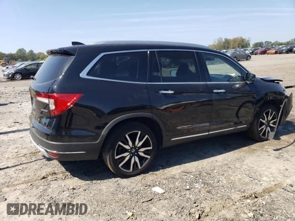 ✅ 2020 Honda Pilot Touring 7-Passenger • VIN: 5FNYF5H65LB009516 • Lot: 81001735. Listed on Copart with 66,757 mi. Free auction sales archive from the USA and detailed vehicle history report at DreamBid. Image 3.
