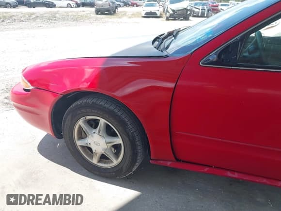 ✅ 2000 Oldsmobile Alero GL1 • VIN: 1G3NL12T9YC306263 • Lot: 42938238. Listed on IAAI with 79,307 mi. Free auction sales archive from the USA and detailed vehicle history report at DreamBid. Image 18.