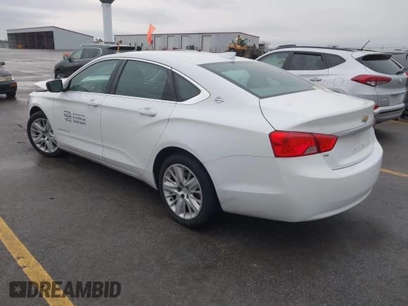 ✅ 2017 Chevrolet Impala LS • VIN: 2G11X5S3XH9157565 • Lot: 41711415. Listed on IAAI with 71,234 mi. Free auction sales archive from the USA and detailed vehicle history report at DreamBid. Image 3.