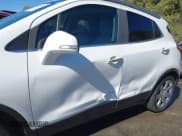 ✅ 2017 Buick Encore Essence • VIN: KL4CJCSB3HB046877 • Lot: 43483880. Listed on IAAI with 130,561 mi. Free auction sales archive from the USA and detailed vehicle history report at DreamBid. Image 6.