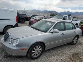 ✅ 2005 Kia Amanti • VIN: KNALD124655082315 • Lot: 62556455. Listed on Copart with 152,993 mi. Free auction sales archive from the USA and detailed vehicle history report at DreamBid. Image 1.