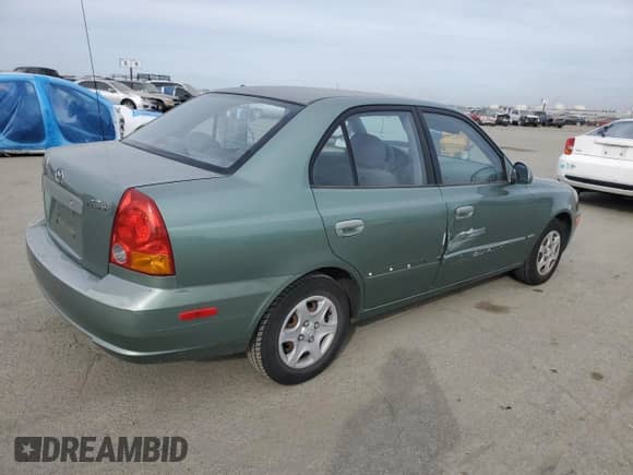 2004 Hyundai Accent GL с VIN KMHCG45C14U540938, выставлен на аукционе Copart как лот 46701935 с пробегом 71 891 миль миль и Списание • Salvage title. История ставок и продаж доступна на DreamBid. Изображение 3.