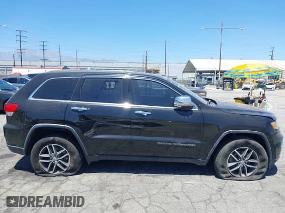 2018 Jeep Grand Cherokee Limited z VIN 1C4RJEBG5JC512008, wystawiony jako IAAI lot #42897081 z przebiegiem 141 938 mil mil oraz . Historia ofert i sprzedaży dostępna na DreamBid. Obrazek 14.