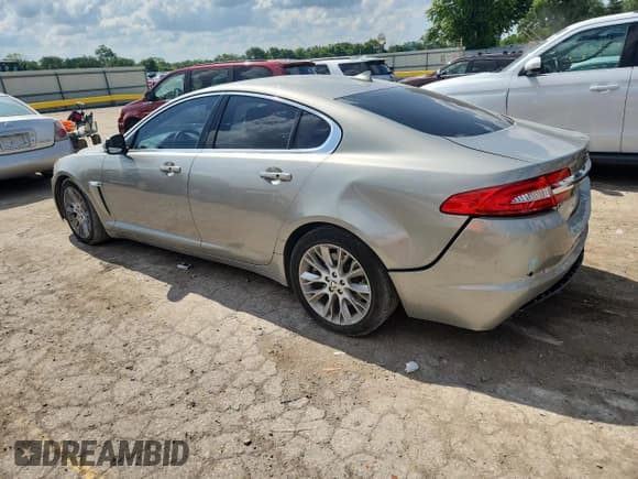✅ 2013 Jaguar XF RWD • VIN: SAJWA0E79D8S95654 • Lot: 64668775. Listed on Copart with 148,413 mi. Free auction sales archive from the USA and detailed vehicle history report at DreamBid. Image 2.