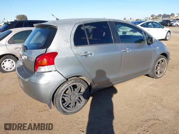 ✅ 2009 Toyota Yaris • VIN: JTDKT903695225893 • Lot: 43805455. Listed on IAAI with 128,710 mi. Free auction sales archive from the USA and detailed vehicle history report at DreamBid. Image 4.