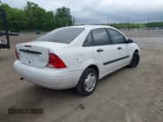 ✅ 2002 Ford Focus LX • VIN: 1FAFP33P42W350981 • Lot: 42245449. Wystawiony na IAAI z przebiegiem Nie podano. Bezpłatny archiwum sprzedaży aukcyjnych z USA i szczegółowy raport historii pojazdu na DreamBid. Zdjęcie 4.