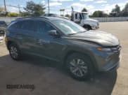 ✅ 2022 Hyundai Tucson Blue • VIN: KM8JBCA10NU013706 • Lot: 75915214. Wystawiony na Copart z przebiegiem 39 342 mil. Bezpłatny archiwum sprzedaży aukcyjnych z USA i szczegółowy raport historii pojazdu na DreamBid. Zdjęcie 4.