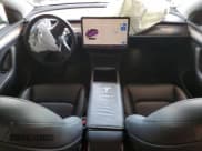 ✅ 2023 Tesla Model Y Performance • VIN: 7SAYGDEF0PA049584 • Lot: 69508355. Wystawiony na Copart z przebiegiem 38 412 mil. Bezpłatny archiwum sprzedaży aukcyjnych z USA i szczegółowy raport historii pojazdu na DreamBid. Zdjęcie 8.