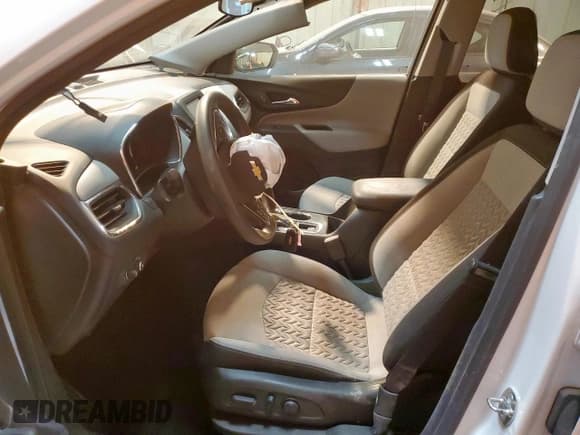 ✅ 2023 Chevrolet Equinox LS • VIN: 3GNAXHEG0PL182520 • Lot: 91026845. Wystawiony na Copart z przebiegiem 31 694 mil. Bezpłatny archiwum sprzedaży aukcyjnych z USA i szczegółowy raport historii pojazdu na DreamBid. Zdjęcie 7.