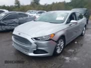 ✅ 2016 Ford Fusion SE • VIN: 3FA6P0H71GR331371 • Lot: 43761726. Listed on IAAI with 218,242 mi. Free auction sales archive from the USA and detailed vehicle history report at DreamBid. Image 2.