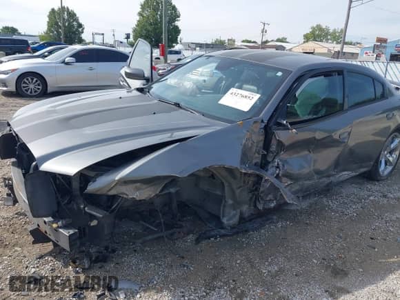 2012 Dodge Charger RT Plus z VIN 2C3CDXCT7CH225584, wystawiony jako IAAI lot #43276852 z przebiegiem 193 535 mil mil oraz . Historia ofert i sprzedaży dostępna na DreamBid. Obrazek 6.