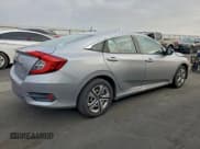 ✅ 2016 Honda Civic LX • VIN: 19XFC2F55GE214936 • Lot: 94490495. Listed on Copart with 105,352 mi. Free auction sales archive from the USA and detailed vehicle history report at DreamBid. Image 3.