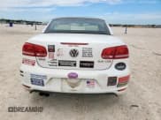 ✅ 2013 Volkswagen Eos Sport • VIN: WVWBW8AH4DV001798 • Lot: 66555435. Listed on Copart with 86,502 mi. Free auction sales archive from the USA and detailed vehicle history report at DreamBid. Image 6.