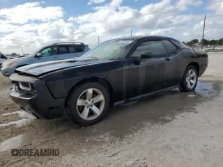 ✅ 2009 Dodge Challenger SE • VIN: 2B3LJ44VX9H560674 • Lot: 87184845. Listed on Copart with 203,300 mi. Free auction sales archive from the USA and detailed vehicle history report at DreamBid. Image 1.