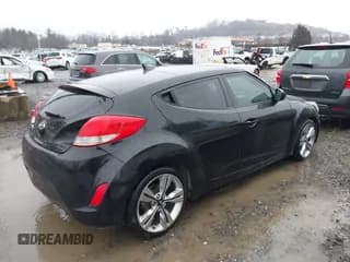 ✅ 2012 Hyundai Veloster w/Gray Int • VIN: KMHTC6AD1CU033106 • Lot: 41528193. Wystawiony na IAAI z przebiegiem 47 215 mil. Bezpłatny archiwum sprzedaży aukcyjnych z USA i szczegółowy raport historii pojazdu na DreamBid. Zdjęcie 4.