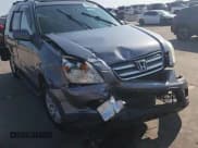 ✅ 2005 Honda CR-V EX SE • VIN: JHLRD78995C021428 • Lot: 72093255. Wystawiony na Copart z przebiegiem 157 116 mil. Bezpłatny archiwum sprzedaży aukcyjnych z USA i szczegółowy raport historii pojazdu na DreamBid. Zdjęcie 14.