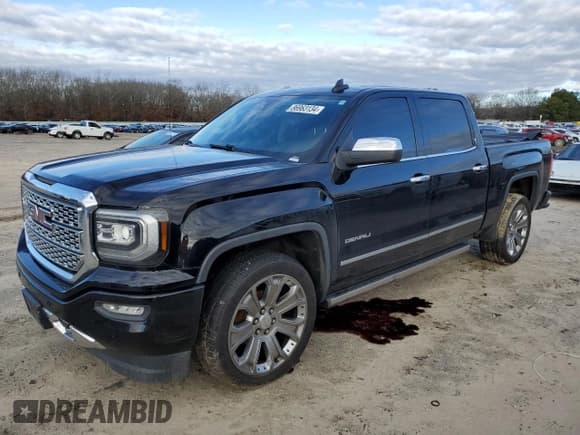 ✅ 2017 GMC Sierra 1500 Denali • VIN: 3GTU2PEJ5HG448778 • Lot: 86963134. Listed on Copart with 126,642 mi. Free auction sales archive from the USA and detailed vehicle history report at DreamBid. Image 1.