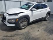 ✅ 2021 Hyundai Kona SEL • VIN: KM8K2CAA4MU735313 • Лот: 70793634. Опубликован ранее на Copart с пробегом 68 468 миль. Бесплатный доступ к архиву аукционных продаж из США и подробный отчёт об истории автомобиля на DreamBid. Изображение 1.
