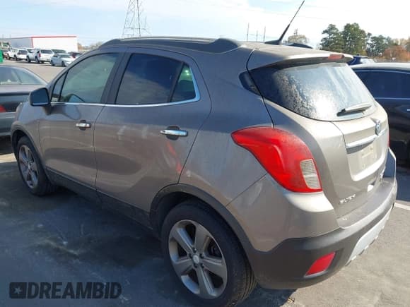 ✅ 2013 Buick Encore Leather • VIN: KL4CJCSBXDB124002 • Lot: 43723515. Listed on IAAI with 158,182 mi. Free auction sales archive from the USA and detailed vehicle history report at DreamBid. Image 3.