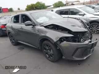 2024 Dodge Hornet R/T Plus z VIN ZACPDFDW9R3A20055, wystawiony jako IAAI lot #42033171 z przebiegiem Nie podano mil oraz . Historia ofert i sprzedaży dostępna na DreamBid. Obrazek 1.