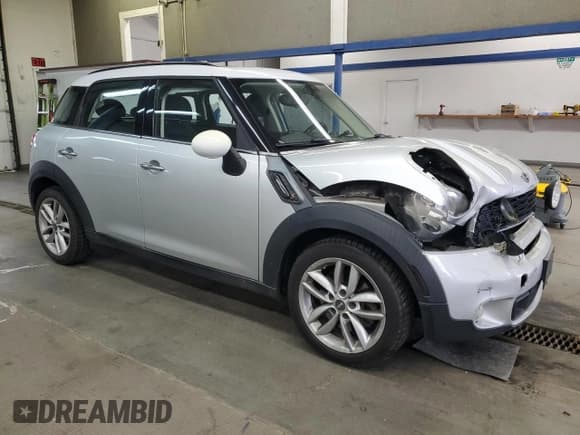 ✅ 2013 MINI Countryman S • VIN: WMWZC3C51DWP22214 • Lot: 93966435. Listed on Copart with 125,664 mi. Free auction sales archive from the USA and detailed vehicle history report at DreamBid. Image 4.