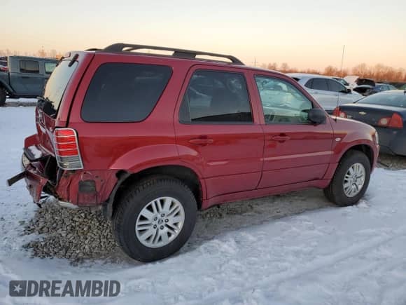 2006 Mercury Mariner Luxury with VIN 4M2YU56146DJ09769, listed as a Copart auction lot 87851795 with 80,894 mi miles and Salvage title. Bid and sale history available at DreamBid. Image 3.